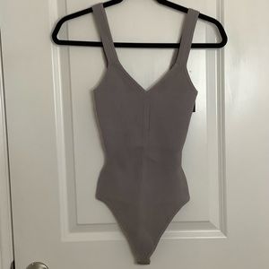 Never-Worn Abercrombie bodysuit, purple color; Sizes S
